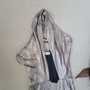 jumpsuit gold metallic sheen with an open front, open back